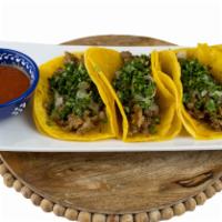 4 Street Taco Dinner · 4 mini tortillas filled with carne asada topped with chopped onions, cilantro, and red salsa...