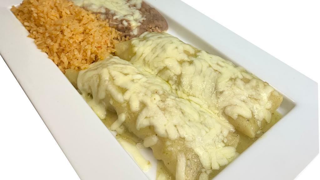 Enchilada Suizas Dinner · 2 corn tortillas stuffed with seasoned chicken and smothered with green tomatillo sauce topped with Jack cheese. Served with rice, beans, and sour cream.