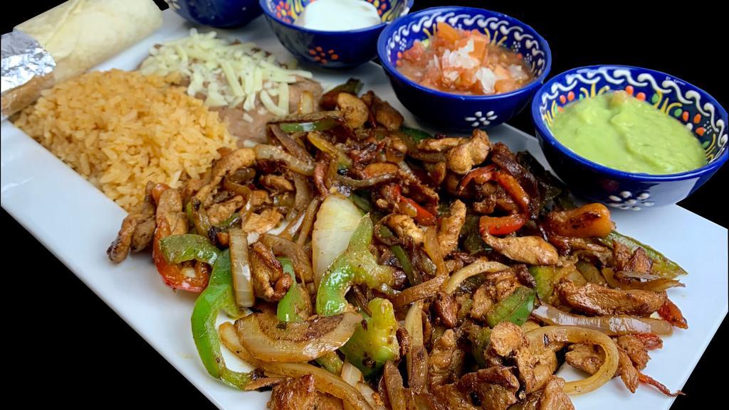 Fajitas Special Dinner · Seasoned and grilled with sautéed onions and bell peppers with guacamole, sour cream, and pico De gallo chicken or beef chicken and beef shrimp (only) vegetarian (veggies only).