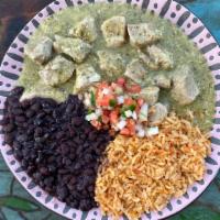 Chile Verde · Tender seasoned pork chunks, smothered in our delicious spicy green tomatillo sauce. Served ...