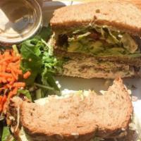 Malibu Tuna Sandwich · Tuna salad, avocado, lettuce or sprouts, tomato, and mayo.