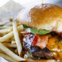 California Classic Burger · Brioche bun, avocado, crisp bacon, cheddar, lettuce, tomato, pickles hoppy poppy ipa burger ...