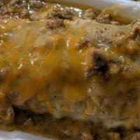Burrito Ranchero · Chile Verde with chunks of pork, rice, beans and cheese inside topped with more Chile Verde ...