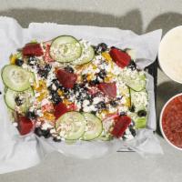 Greek Salad · Lettuce, tomato, onion, cucumber, pepperoncini, olives and feta cheese.