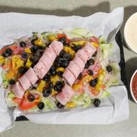 Antipasto Salad · Lettuce, tomato, onion, pepperoncini, olives, provolone cheese, salami and ham.