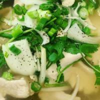 Pho Chicken · Slices of chicken white meat in a rich chicken broth  with rice noodle