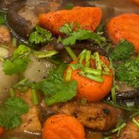Pho Vegetarian · Tofu, carrots, daikon and mushroom in a veggies broth with rice noodle.
