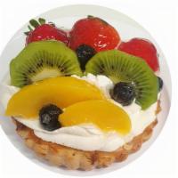 Fruit Tart · Cheese pie with whipp cream and fruits.