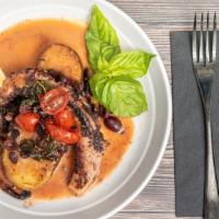 Octopus · Mediterranean style, with grilled potato,  cherry tomatoes and red wine vinaigrette.