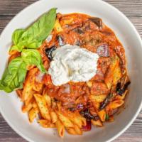 Penne Norma · penne pasta, eggplant, onions, spicy tomato sauce,
ricotta cheese