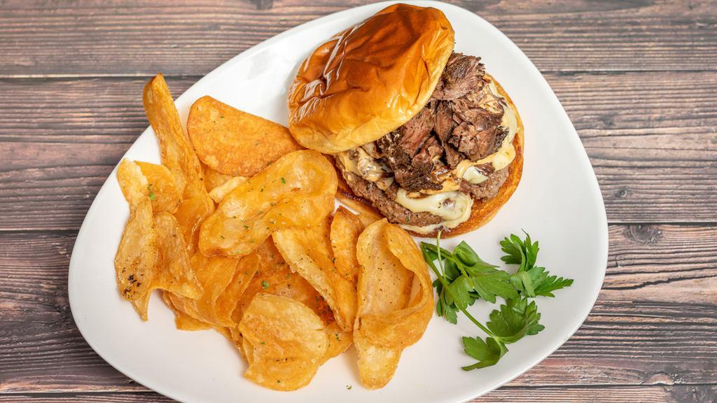 Cr Burger · 1/2 lb ground beef, gruyere, caramelized onions, tomato jam, braised short rib, special sauce, buttered brioche with homemade, seasoned potato chips.