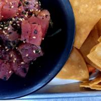 Hawaiian Poke N Chips · Wild-caught Ahi Tuna, Spicy Tuna or Salmon Poke served with our Homemade chips on the side. ...