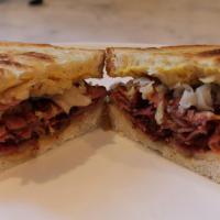 Pastrami Reuben · Toasted sourdough bread, sliced beef pastrami, mustard, fresh sauerkraut and melted provolon...
