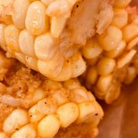 Corn On The Cob · 3 Pieces, tossed in your choice of Cajun Butter Spice Level - Mild, Medium or Fire, Choice y...