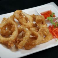 Fried Calamari · Breaded and deep fried served with sweet chili sauce.
