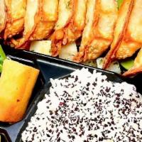 Age Shrimp Gyoza Bento · 6pcs of Deep Fried Shrimp Gyoza with Rice, Spaghetti, Vegetables, Spring Roll, and Pickles. ...