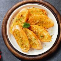 Great Garlic Bread · (Vegetarian) Housemade bread toasted and garnished with butter, garlic, and parsley.