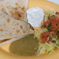Cheese Quesadilla · Flour tortilla with cheese, sides of salsa and sour cream.
