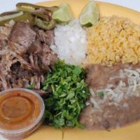 Carnitas Plate · Chop carnitas, includes rice, beans, salsa, and 6 corn tortillas.