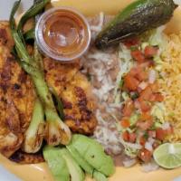 Spicy Chicken Plate · Two pieces of whole chicken breast, includes lettuce, tomato, onions, and 6 corn tortillas.