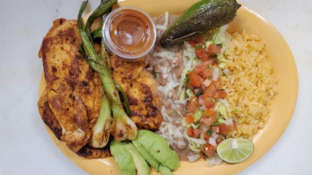 Spicy Chicken Plate · Two pieces of whole chicken breast, includes lettuce, tomato, onions, and 6 corn tortillas.