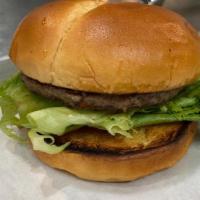 Junior Burger · Three ounce lean beef patty and grilled bun with our home made sauce, lettuce, tomato, pickl...