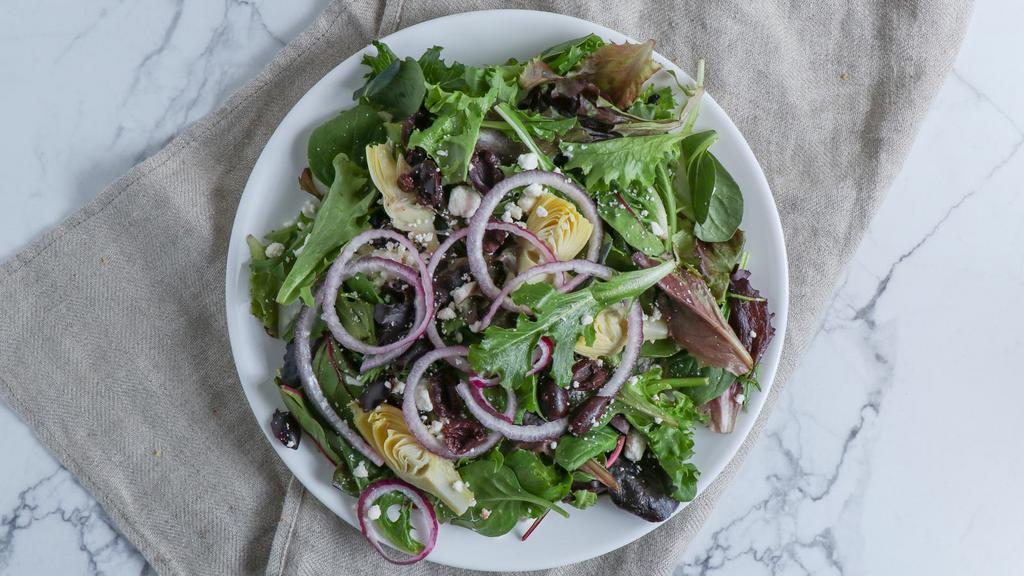 Greek Salad · Mixed greens with greek dressing, artichoke hearts, kalamata olives, and Feta cheese.