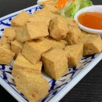 Fried Tofu · Deep fried tofu served with sweet and sour sauce.