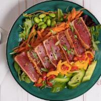 Seared Ahi Tuna Salad · Mixed greens with arugula, seared ahi tuna, shallots, cucumber, edamame, carrots, bell peppe...