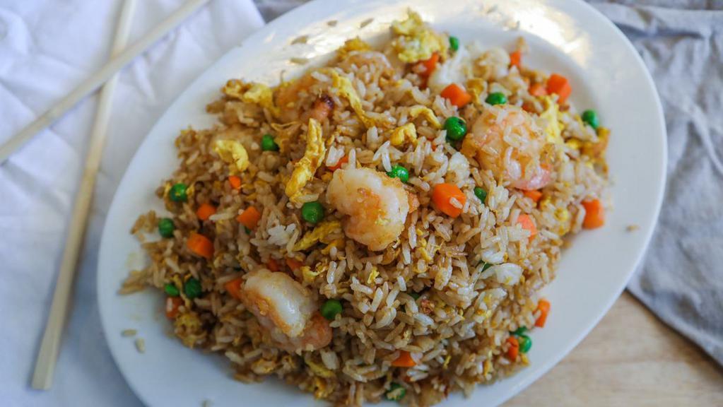 Shrimp Fried Rice · Shrimp with onions, peas, and carrots.