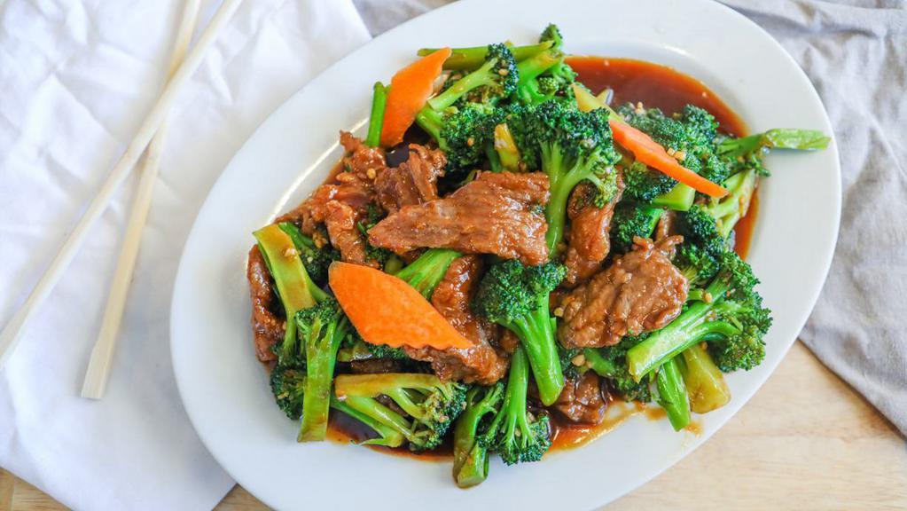 Beef With Broccoli · Stir-fried beef and broccoli. Served with white rice.