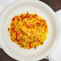 Sweet Specialty Rice · Shirin polo. Sweetened orange peel, rice, almond slivers, and pistachios.
