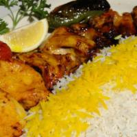 Chicken Shish Kabob · Boneless chicken thigh, bell peppers and onions. Served with white rice and salad.