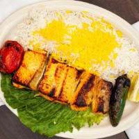 Salmon Kabob · Tasty salmon steaks marinated traditionally and char-broiled to perfection. Served with rice...