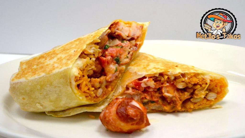 Mariachi Burrito · Bacon wrapped shrimp in a tortilla w/ house toppings
