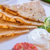 Quesadillas · Whole wheat tortilla, farm fresh veggies, monterey jack cheese.