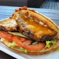 Bruxie Burger · 1/3 pound Angus Beef Patty, Cheddar, Shredded Romaine, Tomato, Pickle, Bruxie Sauce