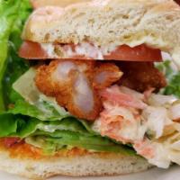 Po'Boy Sandwich · Your choice of fried catfish, fried shrimp or fried chicken served on a soft french roll wit...