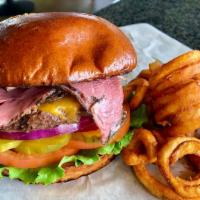 Pastrami Cheeseburger · Topped with pastrami and cheese.