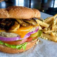 Turkey Mushroom Burger · Turkey patty topped with grilled mushrooms.  Served on a toasted wheat bun.