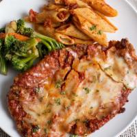 Chicken Parmesan · Lightly Battered Chicken Breast served with Marinara Sauce, Parmesan Cheese, and Melted Mozz...
