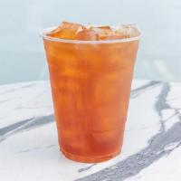 Peach Black Tea · Smooth black tea and sweet peach syrup.