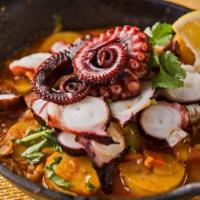Spanish Octopus · tender octopus, grilled & sliced, served on fingerling potatoes sauteed with chorizo, garlic...