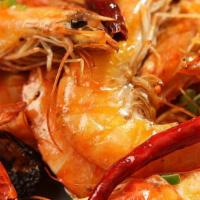 Peel & Eat Shrimp ‘Cucarachas’ · 12 whole shrimp, pan-roasted in the shell with garlic, cotixa cheese, lemon & chile
