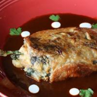 Chile Poblano Relleno De Elote · roasted and lightly fried chile poblano stuffed with grilled corn, calabacitas, cheese, flor...