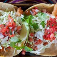 Ensenada Style Fish Tacos (2) · crispy fish, lime sauce, pico, cabbage, avocado sauce