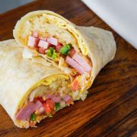 Breakfast Burrito · Two eggs, hash browns, cheese, salsa and ham or bacon or sausage or chorizo or pastrami.
