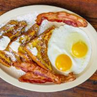 French Toast With 2 Eggs & Bacon Or Sausage · Two slices halved, dusted with powered sugar and topped with whipped butter. With two eggs a...