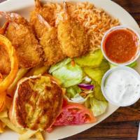 Shrimp Dinner · Shrimp, fresh  salad, fries, onion rings, and dinner roll.
