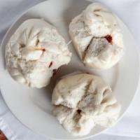 Bbq Pork Bao (4 Pcs.) · Steamed bbq pork in a white bun.